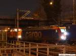 Re 482 003-1 wird mit seinem Containerwagenzug von der Locon 103 aus dem Oberleitungslosen abschnitt wieder unter Strom gesetzt. (10.03.2010)