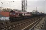 HGK DE 62 mit einem Kesselzug am 27.01.2012 in Berlin-Karow.