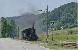 Mit einem Dampfzug der  Emmentalbahn  auf der Fahrt nach Wasen i.
