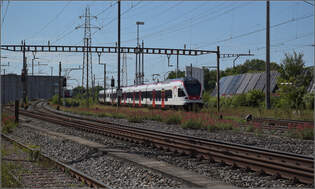 RABe 523 006 und RABe 521 024 in Pratteln.