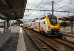 Gefhrt von dem SNCB/NMBS - M7 Bmx TWINDEXX-Triebwagen 91 88 8696 10 7-0 B-B, ex 76107, erreicht der IC 2811 von Knokke ber Gent und Brssel nach Lttich/Lige-Guillemins, am 21 Oktober 2025 den
