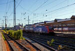 Die an die SBB Cargo International AG vermietete SBB Cargo Re 482 028-8 „ChemOil“ (91 85 4482 028-8 CH-SBBC ) der SBB Cargo AG fhrt am 01 Juli 2025, mit einem HUPAC-KLV/Container-Zug