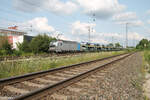 6193 155-9 zieht mit einem offenen Autotransportzug durch Nrnberg Hohe Marter.