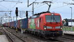 DB Cargo AG, Mainz [D] mit ihrer Vectron   193 309  [NVR-Nummer: 91 80 6193 309-2 D-DB] und einem Containerzug am 04.11.25 Hhe Bahnhof Rodleben.