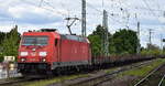 DB Cargo AG, Mainz [D] mit ihrer  185 267-2  [NVR-Nummer: 91 80 6185 267-2 D-DB] und einem gemischten Gterzug am 08.05.25 Hhe Bahnhof Magdeburg Neustadt.