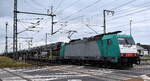 Crossrail Benelux N.V., Antwerpen-Borgerhout [B] mit der geleasten belgischen ATLU Lok   E 186 213  [NVR-Nummer: 91 88 7186 213-5 B-ATLU] und einem PKW-Transportzug am 01.10.25 Hhe