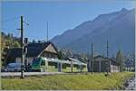 Vor dem Hintergrund mchtiger Berge wartet der TPC ASD ABe 4/8 472 in Les Diablerets auf die Abfahrt als R71 431 nach Aigle.