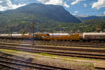 Der Kran IX der Vanomag AG ein 130t GOTTWALD GS 130.10 TS Eisenbahnkran (VTmass 80 85 95 81 702-0 /DB 97 82 54 502 19-5) mit Schutzwagen (80 85 9706 408-4 RID) und Gegengewichtswagen (VTmass 80 85