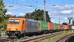ITL Eisenbahngesellschaft mbH, Dresden [D] mit der geleasten ATLU Lok  185 606-1  [NVR-Nummer: 91 80 6185 606-1 D-ATLU] und einem Containerzug am 08.09.25 Höhe Bahnhof Magdeburg-Neustadt.