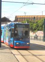 Niederflurbahn der Linie 4 zum Stadion  an der Hst. Bahnhof , 9.5.2009
