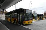 (283'233) - PostAuto Bern - BE 541'062/PID 12'352 - eSolaris am 16. Dezember 2025 beim Bahnhof Spiez