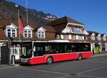 (269'911) - PostAuto Bern - BE 654'090/PID 12'339 - MAN (ex Dr. Richard, A-Wien Nr. 1419) am 16. Dezember 2024 beim Bahnhof Interlaken Ost