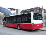 (271'858) - PostAuto Bern - BE 403'166/PID 12'336 - MAN (ex Dr. Richard, A-Wien Nr. 1411) am 11. Februar 2025 beim Bahnhof Interlaken West