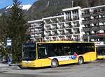 (272'166) - GrindelwaldBus, Grindelwald - Nr. 19/BE 363'305 - MAN/Gppel am 17. Februar 2025 beim Bahnhof Grindelwald