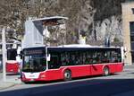 (272'660) - PostAuto Bern - BE 403'166/PID 12'336 - MAN (ex Dr. Richard, A-Wien Nr. 1411) am 7. Mrz 2025 beim Bahnhof Interlaken West