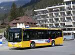 (273'257) - GrindelwaldBus, Grindelwald - Nr. 14/BE 202'568 - MAN/Gppel am 28. Mrz 2025 beim Bahnhof Grindelwald