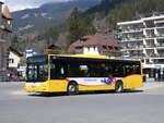 (273'258) - GrindelwaldBus, Grindelwald - Nr. 14/BE 202'568 - MAN/Gppel am 28. Mrz 2025 beim Bahnhof Grindelwald