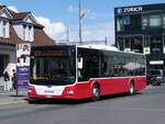 (274'033) - PostAuto Bern - BE 654'090/PID 12'339 - MAN (ex Dr. Richard, A-Wien Nr. 1419) am 15. April 2025 beim Bahnhof Interlaken Ost