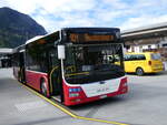 (274'161) - PostAuto Bern - BE 403'166/PID 12'336 - MAN (ex Dr. Richard, A-Wien Nr. 1411) am 24. April 2025 beim Bahnhof Interlaken West