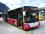 (274'162) - PostAuto Bern - BE 403'166/PID 12'336 - MAN (ex Dr. Richard, A-Wien Nr. 1411) am 24. April 2025 beim Bahnhof Interlaken West