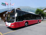 (276'541) - PostAuto Bern - BE 654'090/PID 12'339 - MAN (ex Dr. Richard, A-Wien Nr. 1419) am 9. Juni 2025 in Iseltwald, Dorfplatz