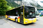 (279'484) - GrindelwaldBus, Grindelwald - Nr. 24/BE 364'408 - MAN/Gppel am 28. August 2025 in Lauterbrunnen, Parkhaus