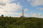 Der Leuchtturm des Ferienortes Blaavand an der dnischen Westkste. Dieser Turm ist noch aktiv und leuchtet jede Nacht. Aber eher zu touristischen Zwecken. Frher war er wohl der wichtigste in Dnemark , denn hier an der Landzunge gibt es ausgedehnte Sandbnke. August 2007