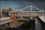 Sonne und Wolken im Wechselspiel ber dem Bahnhof mit Blick auf die Swinemnder Brcke (Berlin Gesundbrunnen 13.10.2009)