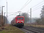 Hier zu sehen (vermutlich) eine berfhrung. Jedenfalls fhrt 114 028 ohne Kontrollziffer am ehemaligen Haltepunkt Ragow vorbei. Ragow den 06.03.2009 