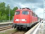 Die 115 293-3 ist mit dem Nachtzug 1449 Saturn in Binz eingetroffen. Gleich hinter der Lok ein CNL Kurswagen von Zrich. 
26. Mai 2006