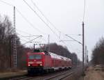 143 809-2 kommt hier mit der RB14 von Berlin Schnefeld Flughafen nach Senftenberg in Ragow durchgefahren. Dieser Ort liegt zwischen Lbbenau und Lbben. 28.02.2009