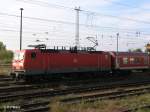 143 012-3 mit ein RB11 Cottbus und ein Fahrradbateilwagen im Zug beim verlassen von Eisenhttenstadt. 03.01.07