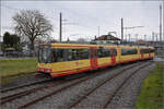 Die Strassenbahn 'Be 4/8 003' alias 94 800 450 003-9 D-TVYS begibt sich in Chavornay auf die Rückfahrt nach Orbe. Dezember 2025.