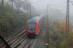Ein Nachschu auf einen RE, der gleich im Nebel verschwindet