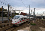 Der DB ICE-3M (BR 406) Tz 4611  Düsseldorf  verlässt am 03.10.2015, als ICE 18 von Frankfurt a.M. Hbf via Köln Hbf, den Bahnhof Liège Guillemins (Lüttich-Guillemins) und fährt weiter in Richtung Bruxelles-Midi.