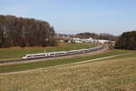 412 211 war als  ICE 118  am 28. Februar 2026 bei Axdorf im Chiemgau auf dem Weg nach M�nster.