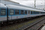 Blauer Silberling D-GfF 50 80 31-34 169-8 ABnrz im Sandwich zwischen 185 391 und 185 394. Duisburg, Februar 2026.