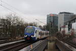 Flirt 3 022 von der Nordbahn als RB61 nach Elmshorn in Hamburg Dammtor am 28.Februar.2025