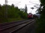 Kurz bevor der Regen einsetzt kommt 143 001 mit ein Kokszug frs Eko in Eisenhttenstadt eingefahren.15.06.06