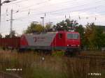 143 001 rckt mit ein Leerzug nach Guben aus und durchfhrt Eisenhttenstadt. 01.10.06