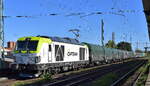 Regiobahn Bitterfeld Berlin GmbH, Bitterfeld-Wolfen [D] mit ihrer Vectron Dual Lok '248 033-3' [NVR-Nummer: 90 80 2248 033-3 D-RBB] und einem Coulzug am 23.09.25 Höhe Bahnhof Magdeburg-Neustadt.