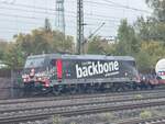 BR 185 325-5 ist mit seinen Mischer in Richtung Norden unterwegs bei HH-Harburg.  19.Oktober 2024