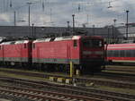 BR 114 039 steht zusammen mit BR 112 133-4 in der Abstellung Berlin-Lichtenberg. 1.Mrz 2025