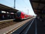 Ein Doppelstock Steuerwagen als RE 15 Mnster (Westf.) Hbf - Emden Hbf bei der Einfahrt in Rheine. 24.05.2009