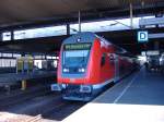 Ein Doppelstocksteuerwagen als RE 11 aus Paderborn Hbf in Dsseldorf Hbf. 17.07.2006