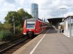 425 597 als RB 48 Kln Hbf - Wuppertal Hbf in Kln Messe/Deutz. 04.10.2008
