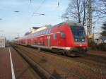 Ein Doppelstock Steuerwagen als RE 7 Krefeld Hbf - Rheine in Greven. 08.12.2008