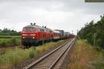 218 397 und eine Schwesterlok befrdern am 10. Juli 2009 den Syltshuttle 1449 nach Niebll. Soeben haben sie den Hindenburgdamm verlassen und durchfahren den Bahnhof Klanxbll.