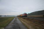 218 455-4 zieht bei Oberdachstetten mit einem langen Bauzug in Richtung Ansbach. 08.12.24
