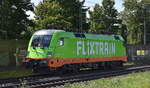 Der Hectoraril Taurus  242.516 , Name: Ferdinand [NVR-Nummer: 91 80 6182 516-5 D-HRDE] in der FLIXTRAIN Folie am 07.08.25 Höhe S-Bahnhof Dedensen/​Gümmer.